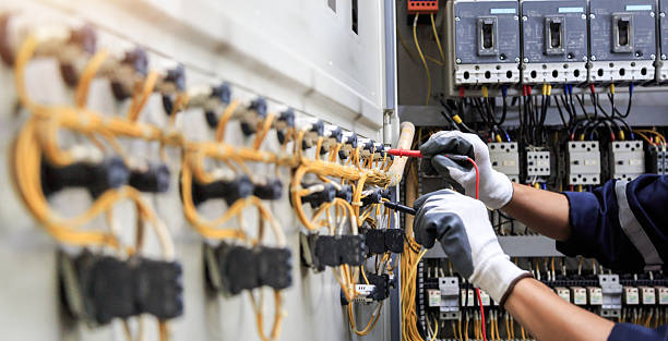 Professional Electrician technician working in Seville, FL